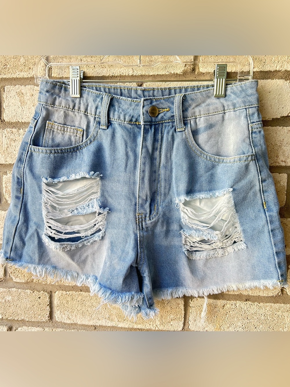 Women's Light Blue Distressed Denim Shorts. Size 28